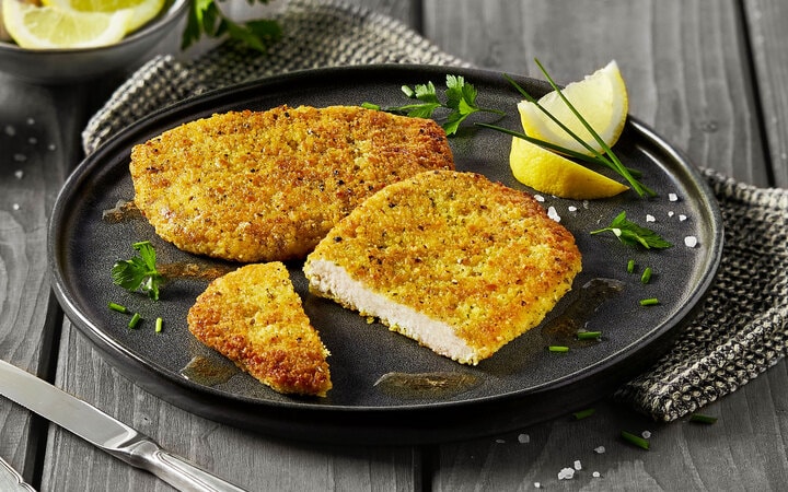 Schnitzel in Kräuter-Zitronenpanade mit 8% Flüssigwürzung (10805 ... Schnitzel in Kräuter-Zitronenpanade mit 8% Flüssigwürzung (10805 ...