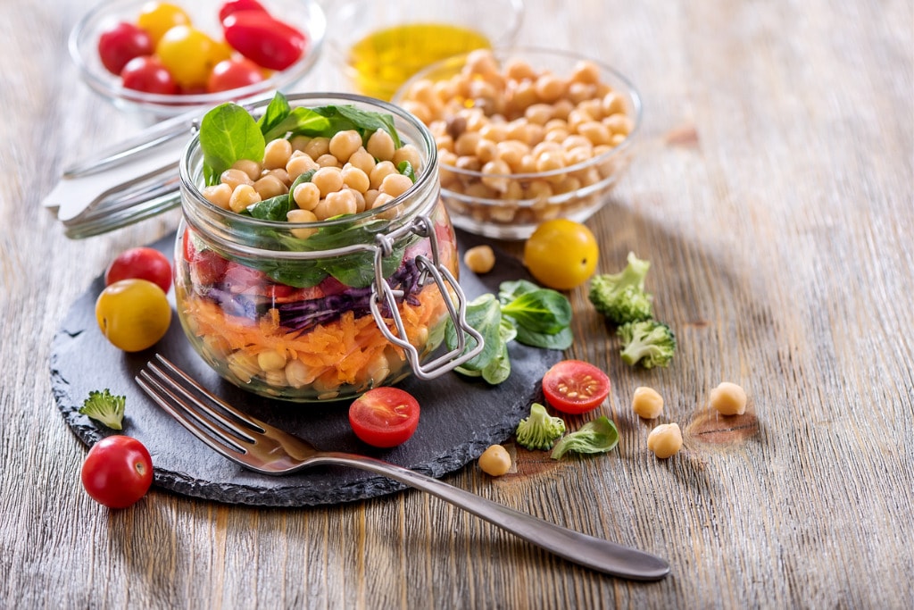 healthy-mason-jar-salad-with-chickpea-and-veggies-diet-vegetarian-picture-id696328776.jpg