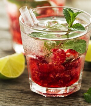 tasty-cold-fresh-drink-lemonade-with-raspberry-mint-ice-and-lime-in-picture-id683428724.jpg